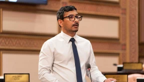 Falah urges opposition to back tax hike on foreign contractors