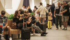 American arrested after ammunition found in luggage
