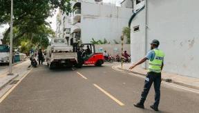 Motorcyclist arrested after hitting traffic police officer